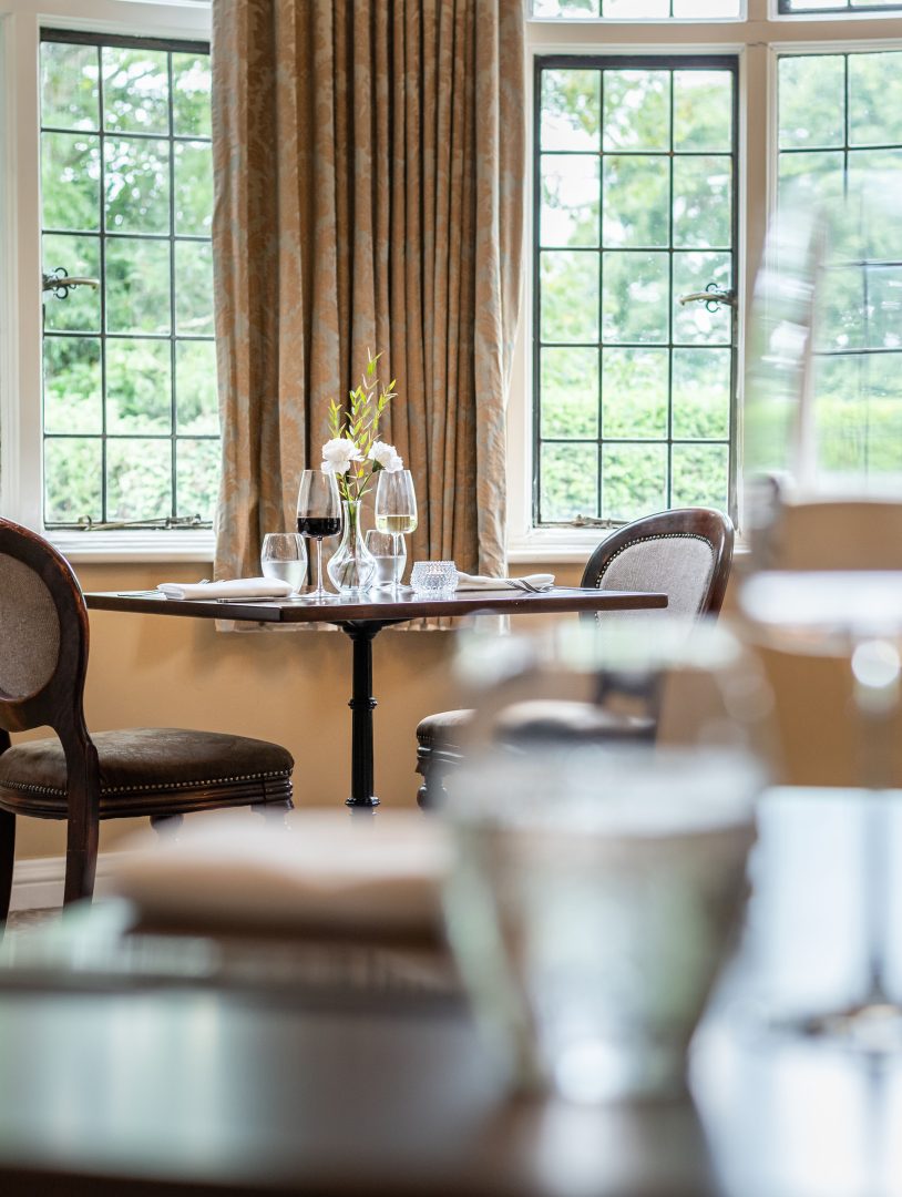 Bartley Lodge restaurant table with wine