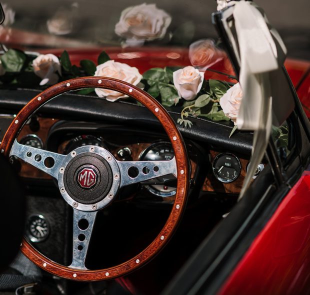 Wedding MG car steering wheel with flowers