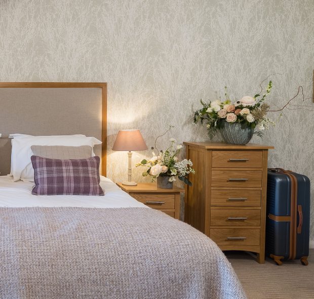 Bed and side table at Beaulieu