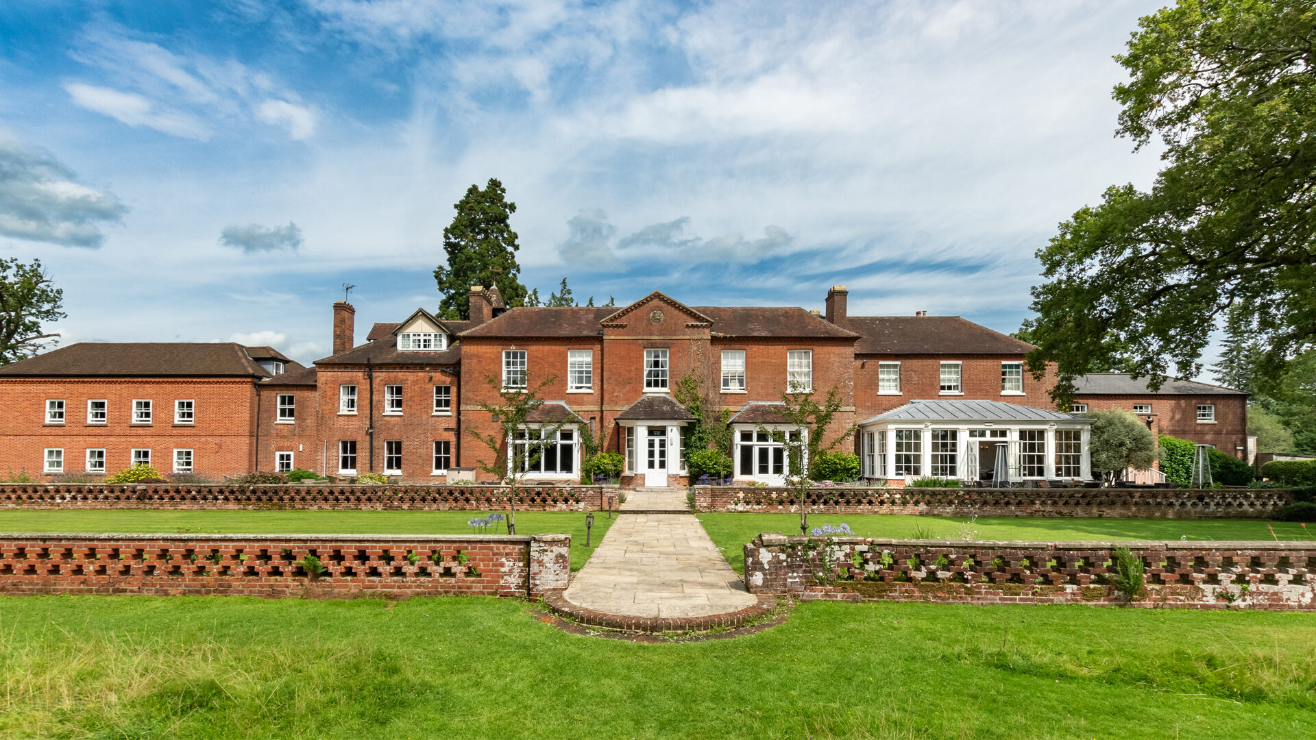 Bartley Lodge Hotel exterior surrounded by the beautiful New Forest