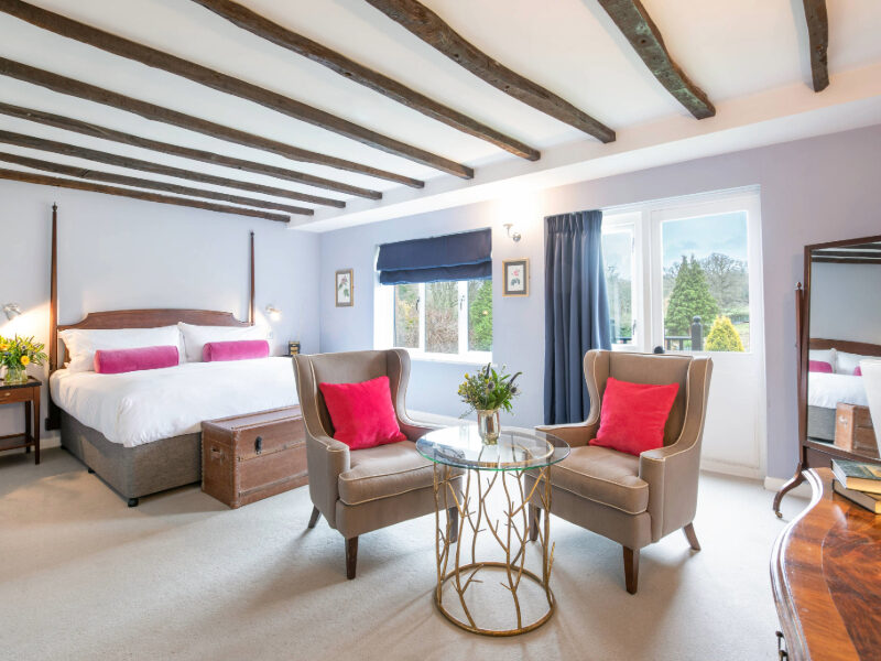 A luxurious suite at a New Forest hotel, featuring elegant decor, spacious interiors, and stunning views. Enjoy our exclusive 2-for-1 offer for an unforgettable stay in the heart of the New Forest.